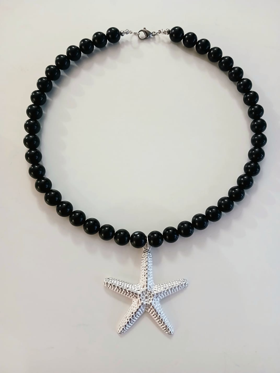 Colgante maxi estrella plateada